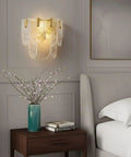 Wall Sconce Lights Indoor Bedroom Hallway Modern Art,Gold Brass,Layered Clear Textured Shell Glass Shade,s,illuminating bedside.