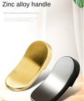 Close-up view of modern zinc alloy handles, featuring sleek gold and black finishes, highlighting design and durability.