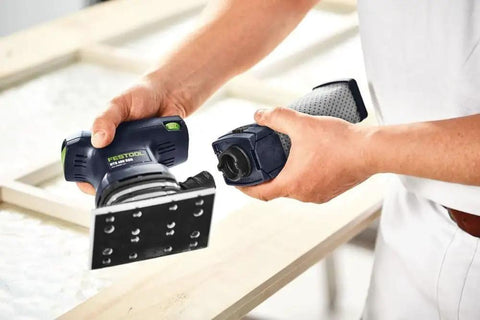 Man holding Finish Orbital Sander RTS 400 REQ Plus With 250W Motor MMC Electronics Ergonomic Rubberized Grip