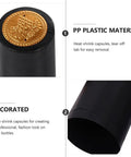 Sleek Black Wine Bottle Shrink Caps Engineered For Fast Heat Shrink Sealing Hella Durable Premium PVC Build close-up of black capsule with golden detail.