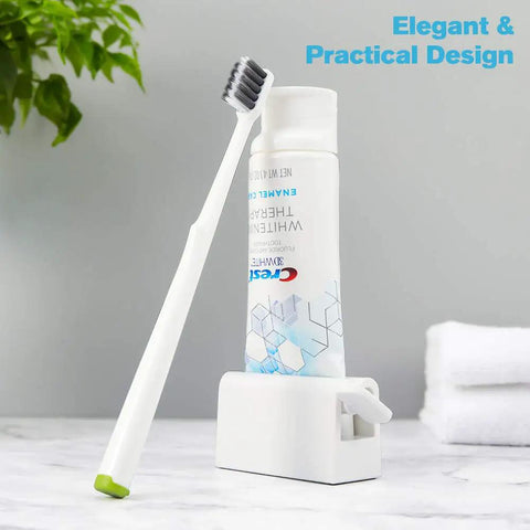 Two Pack Minimalist Toothpaste Tube Squeezers Roller Tool For Easy Mess Free Squeezing Eco Friendly White Dispenser Durable ABS Plastic No More Wasted Paste Simple Kitchen Counter Must Have showing toothbrush with toothpaste tube in holder