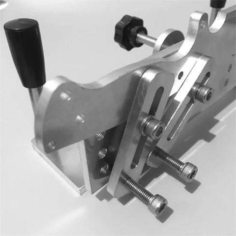 Hefty Aluminum Belt Sander Knife Jig Featuring Smooth Adjustable Angle Grinding Guide detailed close-up showing screws and grip handles.