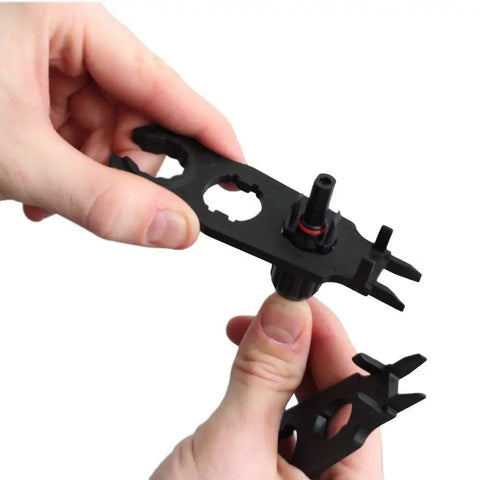 Person using Solar Panel Connector Assembly Tool For Quick Wire Setup And Easy Disconnects Durable Hard Plastic Build