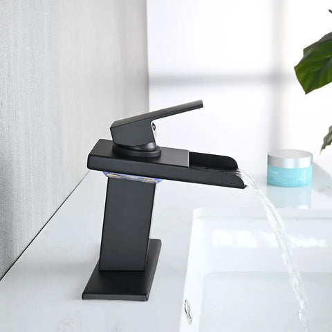 LED Temperature Sensing Matte Black Waterfall Faucet For One Hole Sinks No Sweat Install Vanity Tap With Metal Pop Up Drain Dual Water Lines Stainless Steel Spout Color Changing LED For Cold To Hot Water in action
