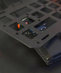 Rugged Tactical Sun Visor Rack With Reinforced Panels And Secure Lash Bands For Tesla Cybertruck close-up showing durable design and tools storage.