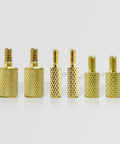 Six Pack Brass Gun Cleaning Rod Fitting Adapters Set With 5-40 To 8-32, 8-32 To 5/16-27, And 8-32 To 10-32 Threads, shown in gold brass