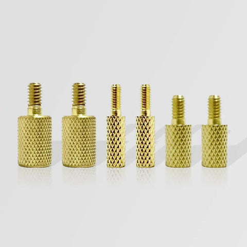 Six Pack Brass Gun Cleaning Rod Fitting Adapters Set With 5-40 To 8-32, 8-32 To 5/16-27, And 8-32 To 10-32 Threads, shown in gold brass