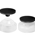 Sprinkler check valve pair, white plastic bodies with black caps, front view, 2-pack