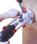 Richelieu R77229 drill guide attachment, installed on drill; silver metal for 1/4 in. and 3/8 in. drill bits.