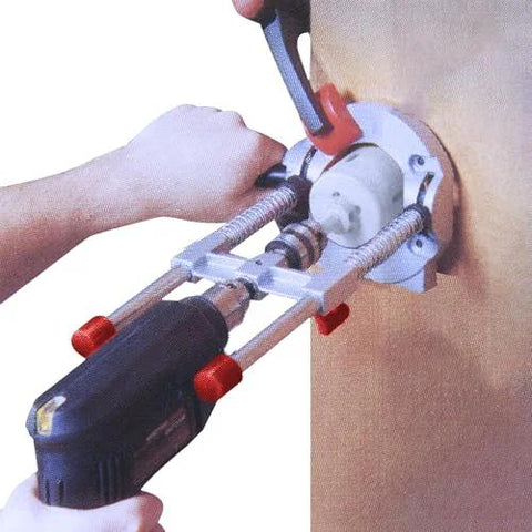 Richelieu R77229 drill guide attachment, installed on drill; silver metal for 1/4 in. and 3/8 in. drill bits.