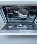 Heavy Duty Full Size Drawer Dishwasher For Bustling Kitchens Quick Wash Cycle with dishes in the pull-out tray.