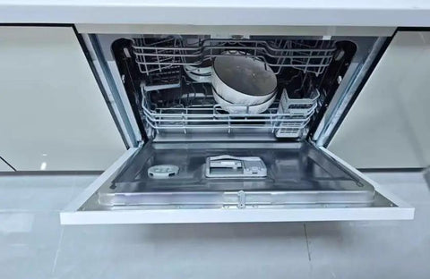 Full Size Drawer Dishwasher With Hella Rapid Clean Settings And Spacious Plate Storage Totally Silent Built In Appliance interior with dishes.