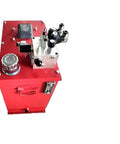 Rock Solid Silent Oil Immersed Hydraulic Pump Station And Compact Power Unit For Home Elevator Or Small Hydraulic Press With Shop Grade Valves And Butter Smooth Performance, red steel unit with assorted hydraulic connections.