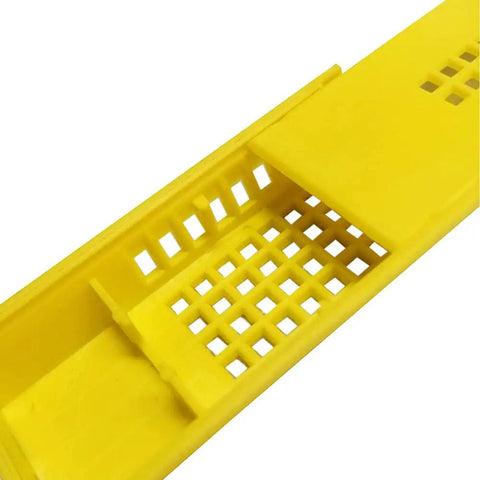 Close-up of yellow Plastic Queen Bee Cages 12 Pack Beekeeping Go To Transporting Catcher Kit for Easy Queen Rearing and Insectary Box Tool Set