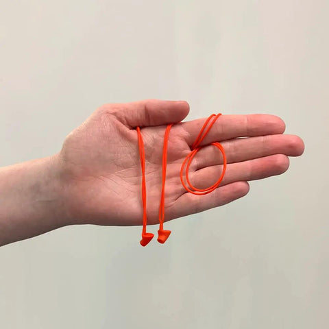 Kids Calmer Ear Plugs Alternative For Daily Noise Relief No Muffling Soft Silicone Reusable Ear Plugs in hand