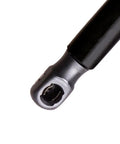 Close-up of a black Beefy Trunk Lift Support Gas Strut For Volkswagen Jetta 2011-2018 with metal attachment.