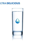 Glass of fresh water from Countertop Drinking Water Filter System Gives Fresh Tasting Tap Water Removes Up To Ninety Seven Percent Of Chlorine