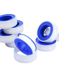 30 Pack One Half Inch Teflon Tape Industrial Thread Seal Tapes For Plumbing Waterproof Seals 394 Inch Each Roll Perfect For Plumbers And DIY Projects On Threaded Pipes, showing eight white rolls with blue cores.