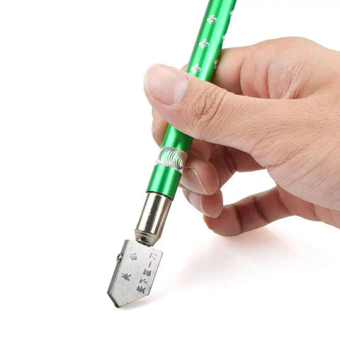 Oil Fueled Glass Cutter With Brass Handle, Self Oiling Carbide Wheel, 138 Degree Cutting Angle held in hand