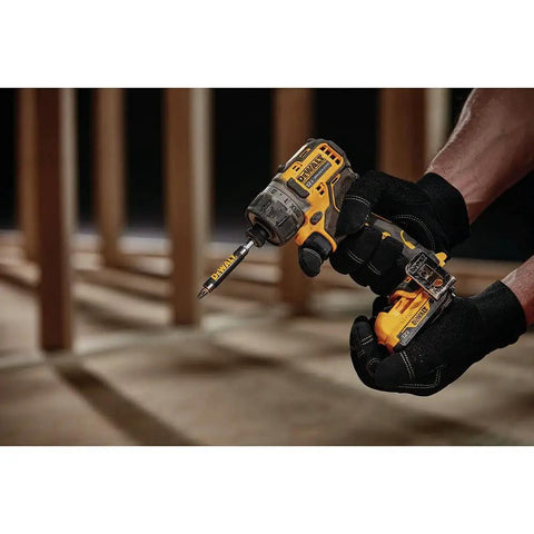 User holding Xtreme 12V Cordless Screwdriver with Brushless Motor, One Quarter Inch Quick Release Hex, ideal for home projects.