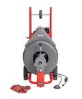 Heavy Workhorse 115 Volt Drain Cleaning Machine With Auto Feed Cable Control and 5 8 Inch Tool Kit For Lateral Lines Pack And Go Sewer Snake Dredger, red and gray unit with gloves