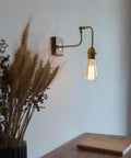 Vintage Brass Wall Sconce, Industrial Wood Light Fixture with adjustable brass arm and walnut wood base.