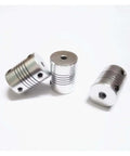 Upgrade Your CNC Setup With This Flex Shaft Coupler Bundle Of 4 Pieces For Smooth Motor Alignment Featuring Aluminum Build And Fits Common D18L25 Sizes Like 7mm And 8mm For Serious DIY Projects, three aluminum CNC shaft couplers on white