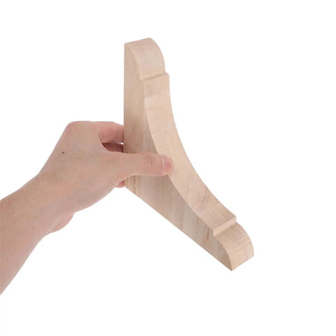 Hand holding Sturdy Wood Triangle Shelf Brackets For Floating Shelves Wall Mounted L Shaped Supports With Flexible Modular Design Easy Install
