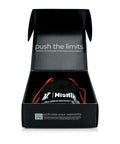 Mishimoto product box open with 'push the limits' text and branded merchandise inside.