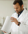 Scientist examining PECO Filter With Activated Carbon For Air Pro Purifier High Efficiency Replacement for air quality analysis.