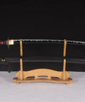 Handmade Practice Katana For Iaido Training Full Tang Sharp Blade Japanese Samurai Sword on wooden stand.