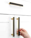 Matte Black and Gold Cabinet Pulls Set, 5 Pack, 5 Inch Center-To-Center Two-Tone Hardware installed on white cabinet