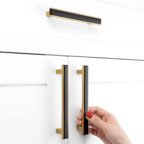 Matte Black and Gold Cabinet Pulls Set, 5 Pack, 5 Inch Center-To-Center Two-Tone Hardware installed on white cabinet