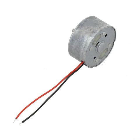 High Output Dc Motor Running 1.5 To 6V Kicking Out A Clean 9000 Rpm inside a round metal casing with black and red wires.