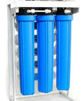 Smooth Sailing On Clean Water This Ready To Roll 800 Gpd Reverse Osmosis Filtration System Drops Booster Pump Right In For Cafes Salons And Bars Nsf Certified with blue filters and white frame.