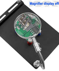 Pro Grade Three Arm Soldering Magnifier Tool With Flexible Gooseneck Arms, 3X Magnifying Glass on a circuit board, heavy duty base