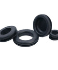 125 Piece Rubber Grommets Kit With Open And Closed Grommets And Storage Case For Cable And Wiring Projects, Automotive And Marine Electrical, DIY Home Improvement Gear For Quick, Clean Wire Runs. black rubber grommets arranged on white background