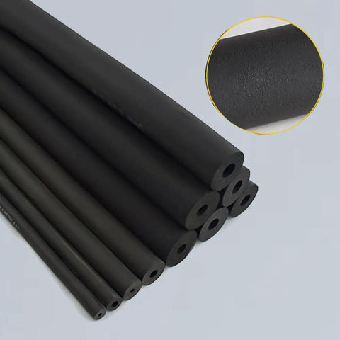 Stack of Pipe Insulation Foam Tubing One Inch Inner Diameter Six Feet Long Rubber Foam Insulation shown close up with texture detail.
