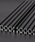 20 Series T Slot Aluminum Extrusion Profile 2080 48 Inch Length European Standard Anodized Linear Rail For 3D Printer Parts And CNC DIY Pro Grade Black Two 1220mm Pieces, close-up of two black anodized rails