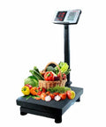 Hella Tough Digital Platform Scale With Big Led Display And Rust Resistant Deck Optimized For Warehouse Shipping Luggage Freight And Heavy Duty Tasks Up To 660 Lbs with vegetables and basket.