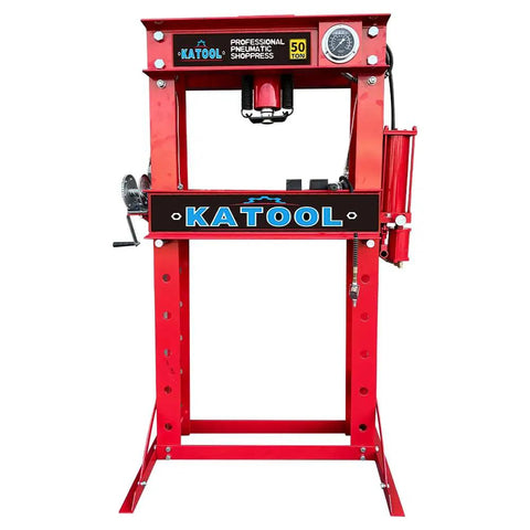 Front view of a red 50 Ton Hydraulic Shop Press With H Frame Workhorse Adjustable Working Table Height Twenty Seven And A Half Inch Bed Seven And A Half Inch Stroke One Hundred Ten To One Hundred Twenty Five PSI Air Quarter Inch Inlet Zero To Forty Inch Work Range Garage, with sturdy steel construction.