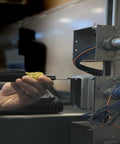 Person using 6 In 1 Tapping Tool From Klein Tools With Cushion Grip For Repairing And Cleaning Threads Auto Re-Threads To Next Size If Stripped on wiring box