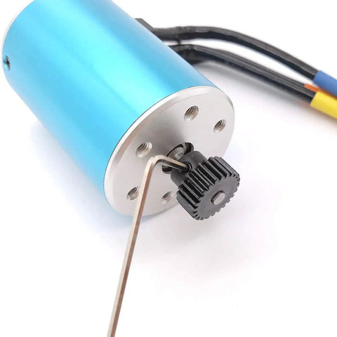 Close-up of MakerDoIt 48P Pinion Gear Set 3.175mm 24T installed on motor with hex key, showing smooth mesh for RC cars and trucks.