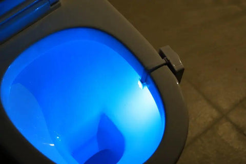 Toilet Night Light Motion Sensor LED Lamp 2 Pack 8 Color Changing Bathroom Nightlight illuminating toilet bowl with blue glow.