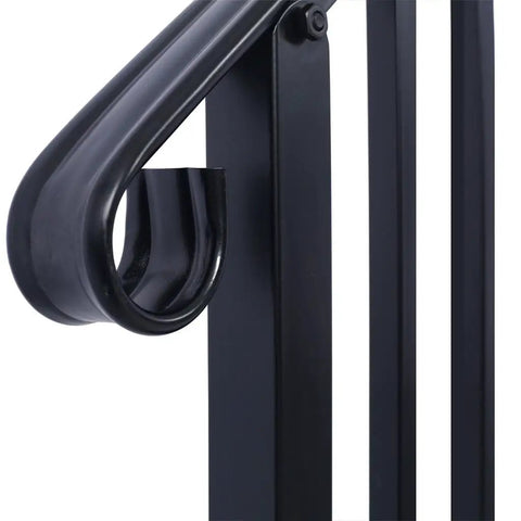 Rock Solid Three Step Outdoor Handrail Featuring Smooth Curved Wrought Iron Frame With Heavy Duty Rust Resistant Steel Railing close-up of curved top rail detail