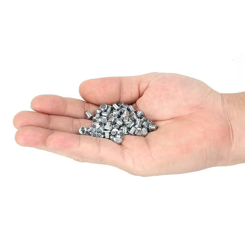Heavy Duty Non Slip Tire Studs For Cars Trucks Atvs And Motorcycles With Built Different Tungsten Steel Core For Ice Snow And Mud Traction 100 Piece Pack in a hand.