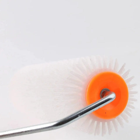 Close-up of 9 Inch Latex Floor Leveling Screed Roller Tool Heavy Hitter For Epoxy Floors showing white bristles and orange hub.