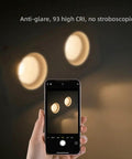 Dimmable Recessed LED Light Fixture With 2 Heads, Canless Gimbal 14W, anti-glare feature demonstrated with smartphone camera
