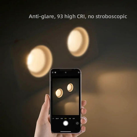 Dimmable Recessed LED Light Fixture With 2 Heads, Canless Gimbal 14W, anti-glare feature demonstrated with smartphone camera