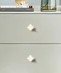 Six Pack White Dresser Knobs Set Featuring Pearl Clover Design With Gold Finish For Cabinets And Drawers on dresser